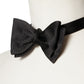 Tied black bow tie made of pure silk